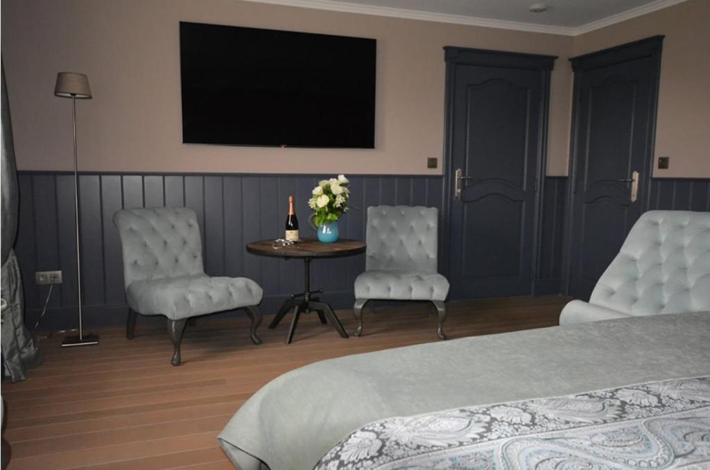 Postel nebo postele na pokoji v ubytování B&B Serenity