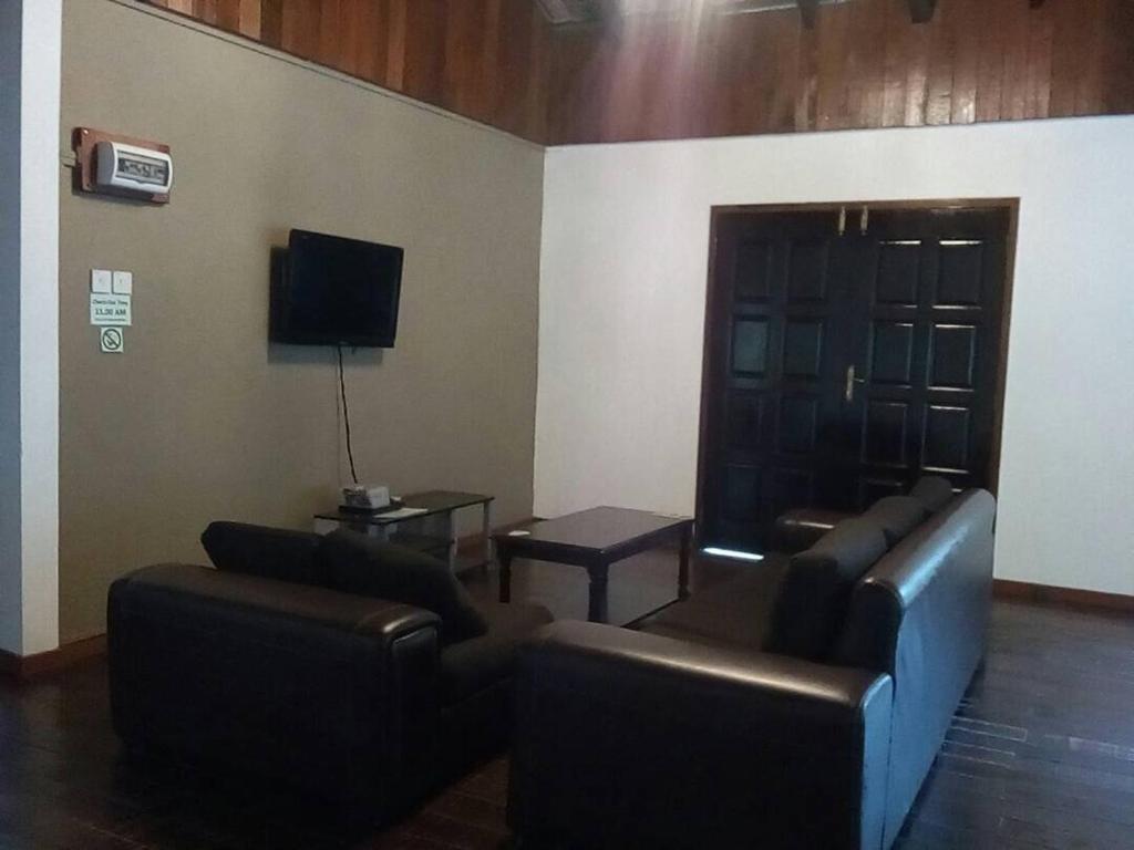 TV a/nebo společenská místnost v ubytování J Residence