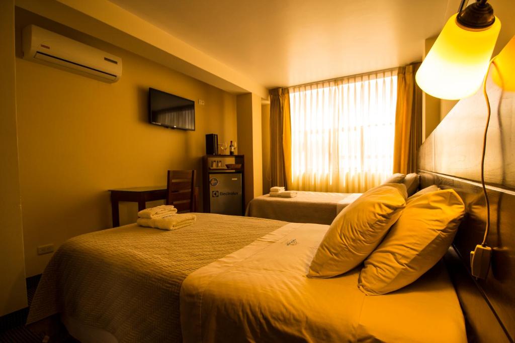 Katil atau katil-katil dalam bilik di El Puerto Hotel