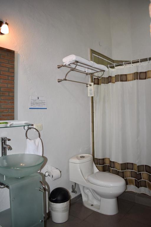 Koupelna v ubytování Hotel Ana Catalina and Suites