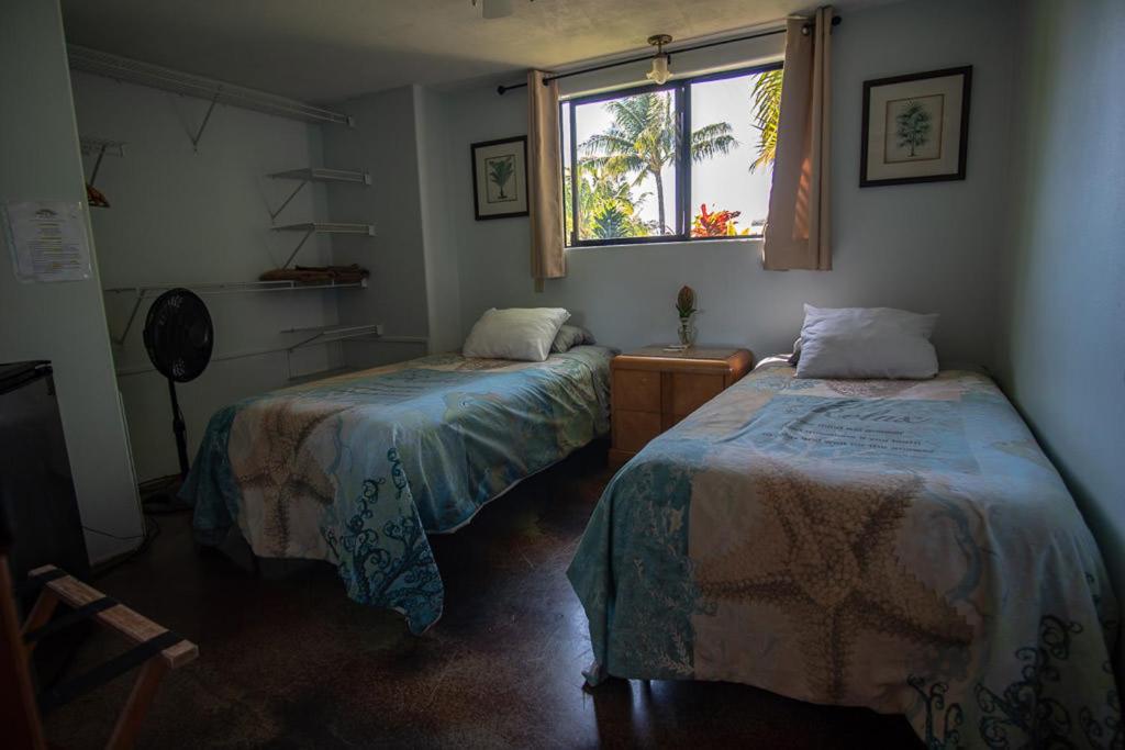 Letto o letti in una camera di God's Peace of Maui