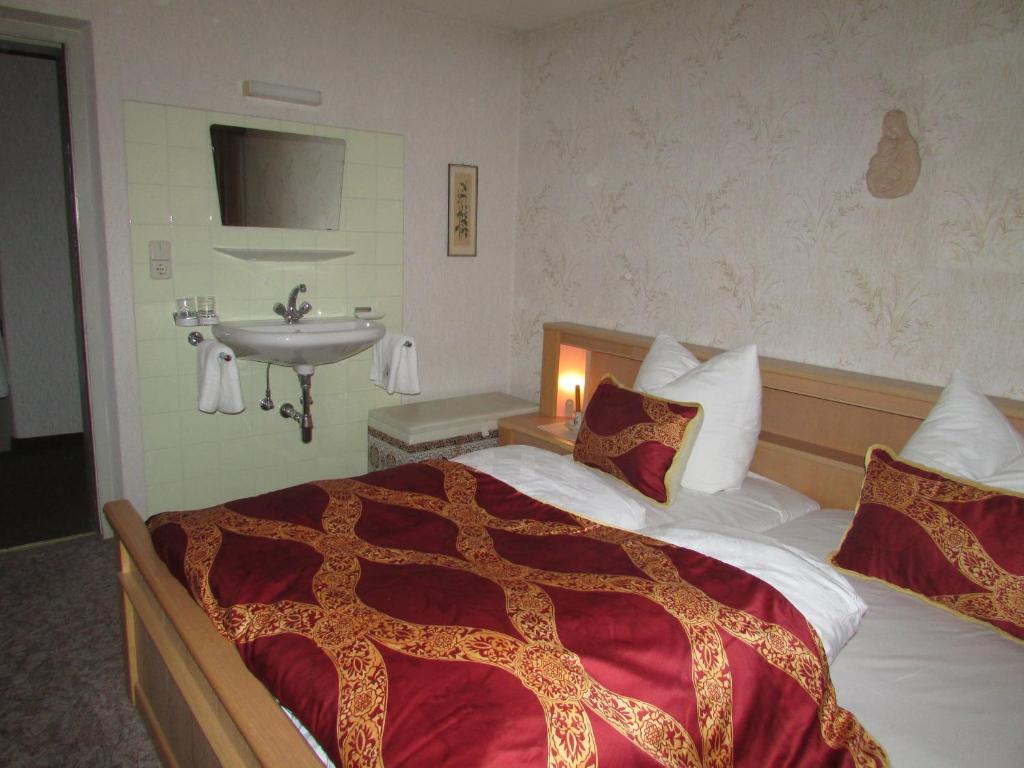 Letto o letti in una camera di Ferienhaus Tschenett