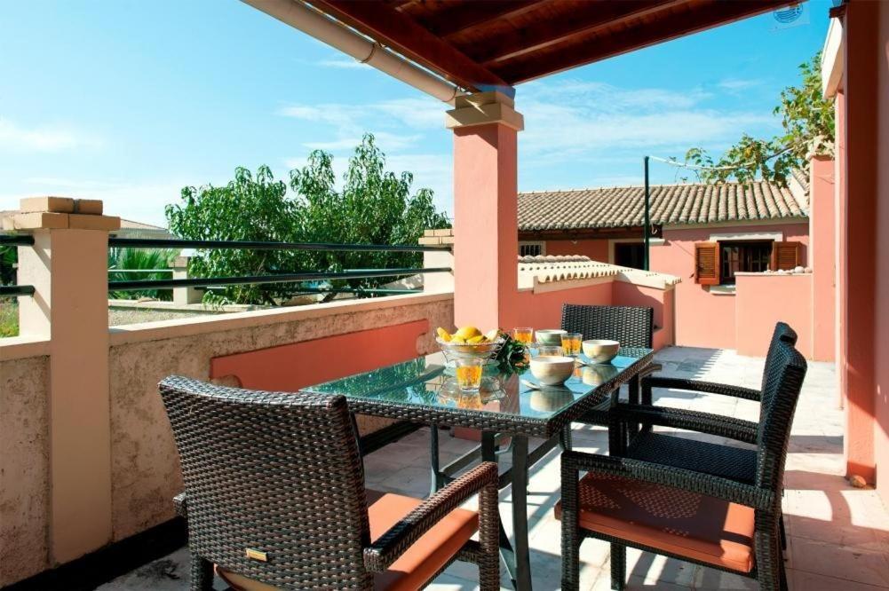 Balkón nebo terasa v ubytování Amalia Cottages