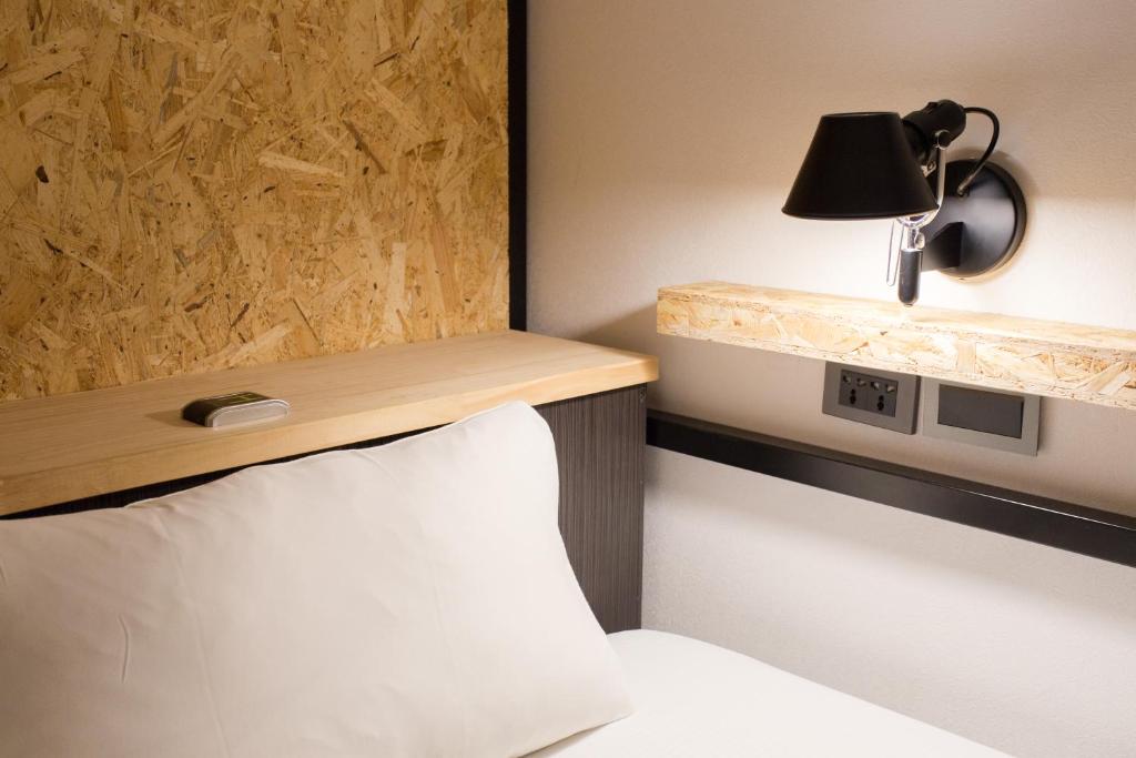 Postel nebo postele na pokoji v ubytování Light Hostel Hualien