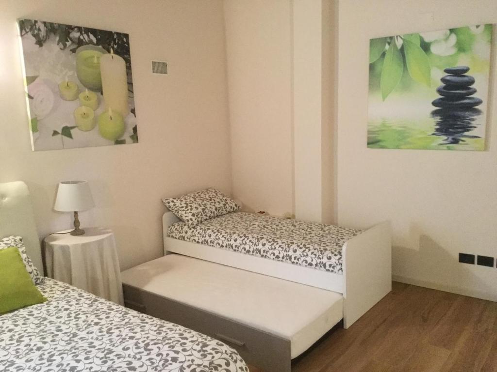 Postel nebo postele na pokoji v ubytování B&B CORTE SANT'ANGELO