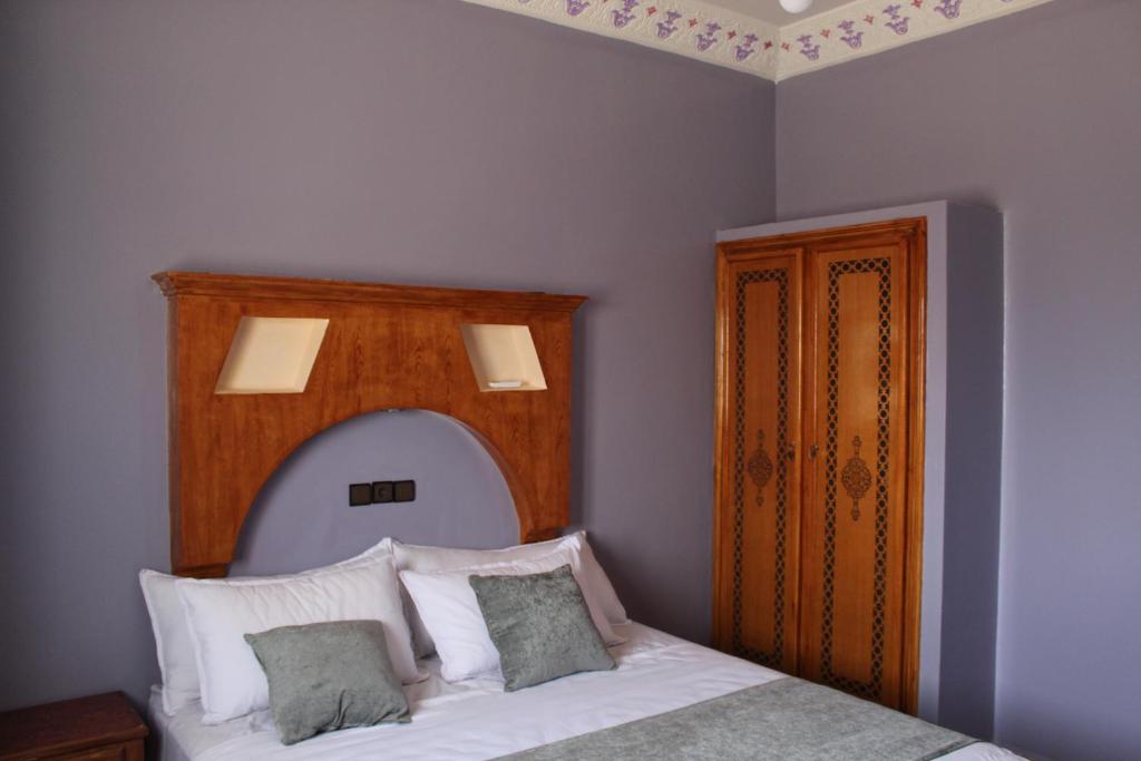 Ένα ή περισσότερα κρεβάτια σε δωμάτιο στο Merzouga Luxury Apartment