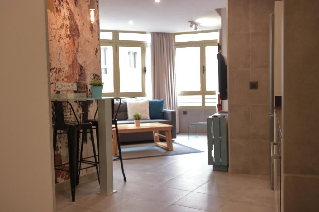 Posedenie v ubytovaní Piso con piscina y garaje en la Playa de Las Canteras