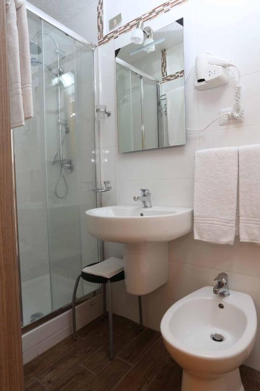 Koupelna v ubytování Hotel Piola