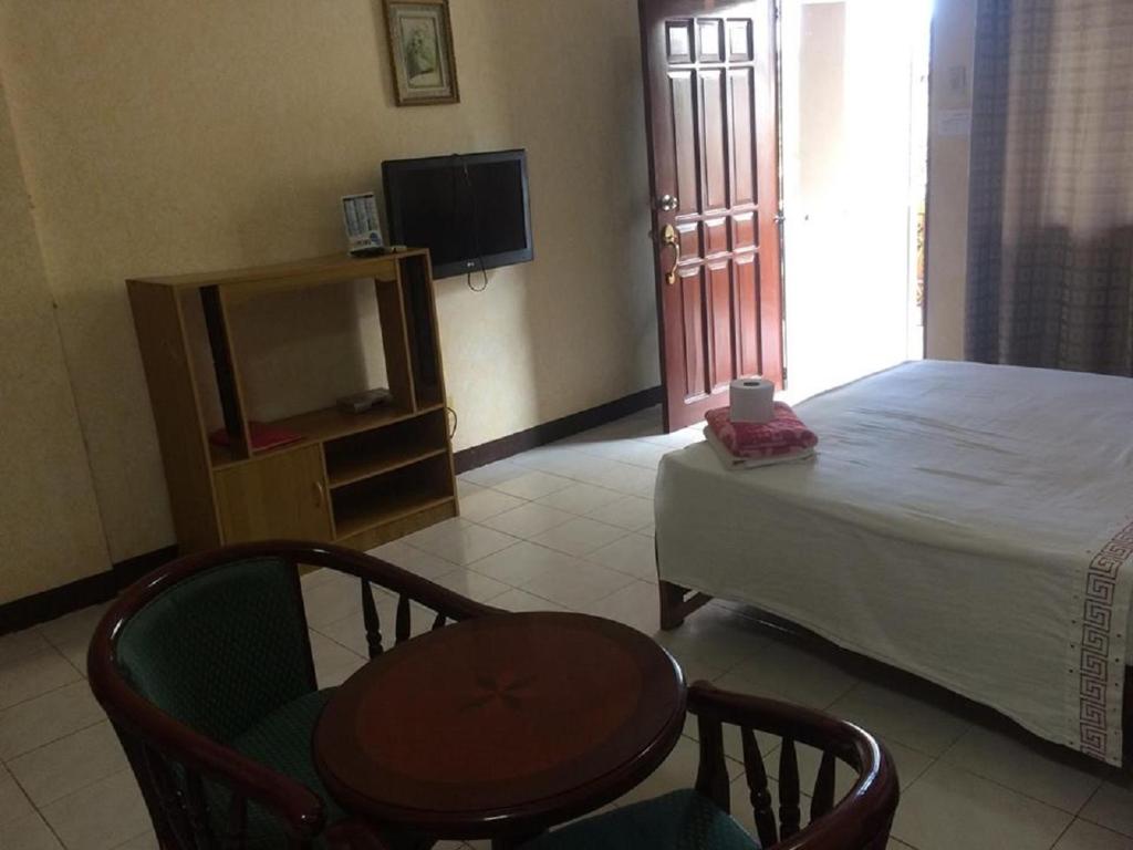 TV a/nebo společenská místnost v ubytování Sunrise Apartelle
