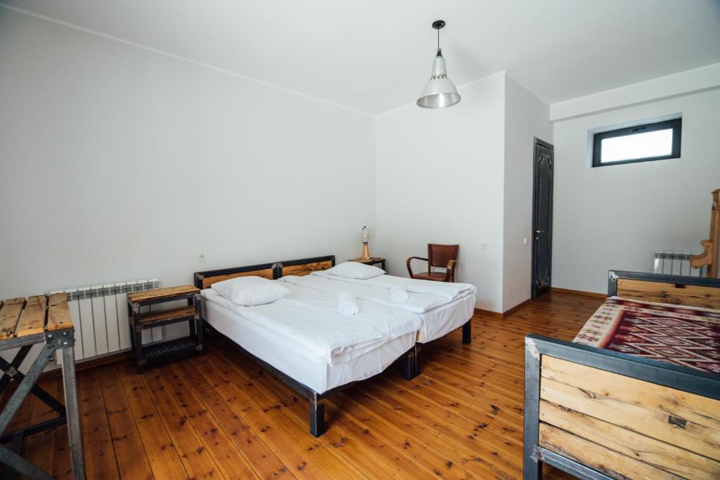 Katil atau katil-katil dalam bilik di Green Sheep Boutique Hotel