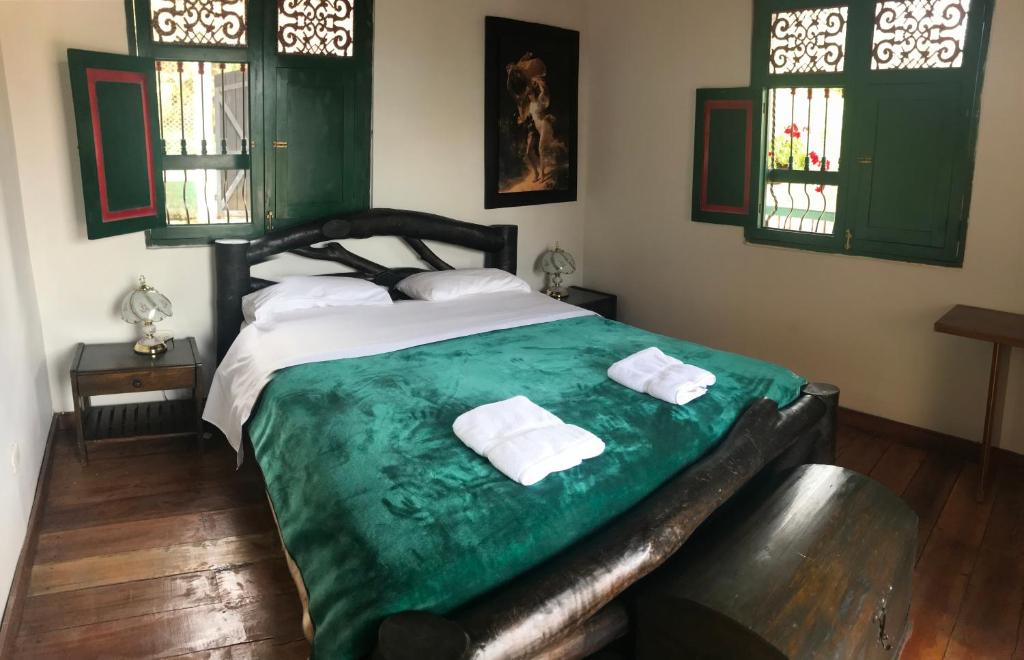Postel nebo postele na pokoji v ubytování Finca Campestre La Adelita B&B