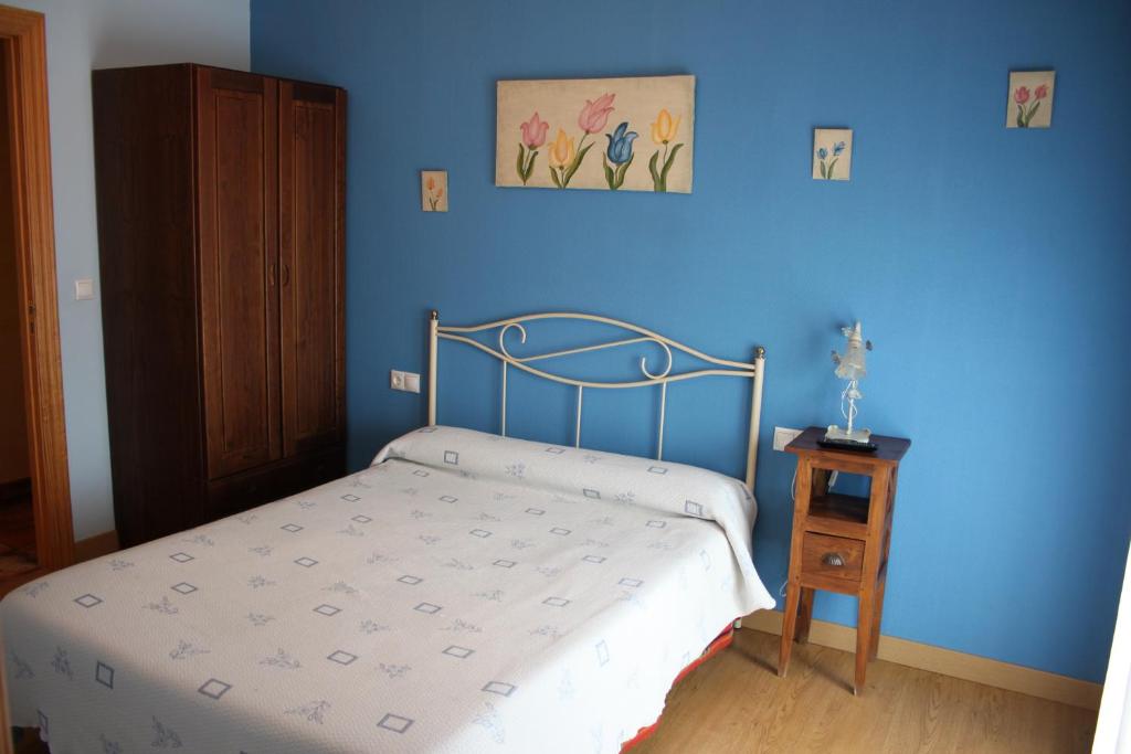 Postel nebo postele na pokoji v ubytování El Rincon del Labrador