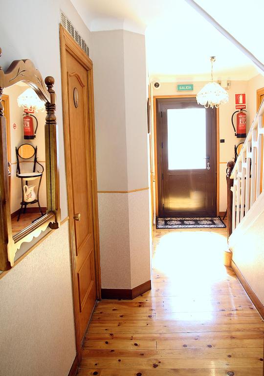 Postel nebo postele na pokoji v ubytování Hostal Fonda Prat