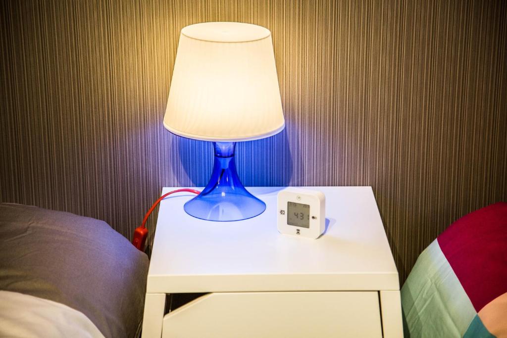 Postel nebo postele na pokoji v ubytování Universal Haneda