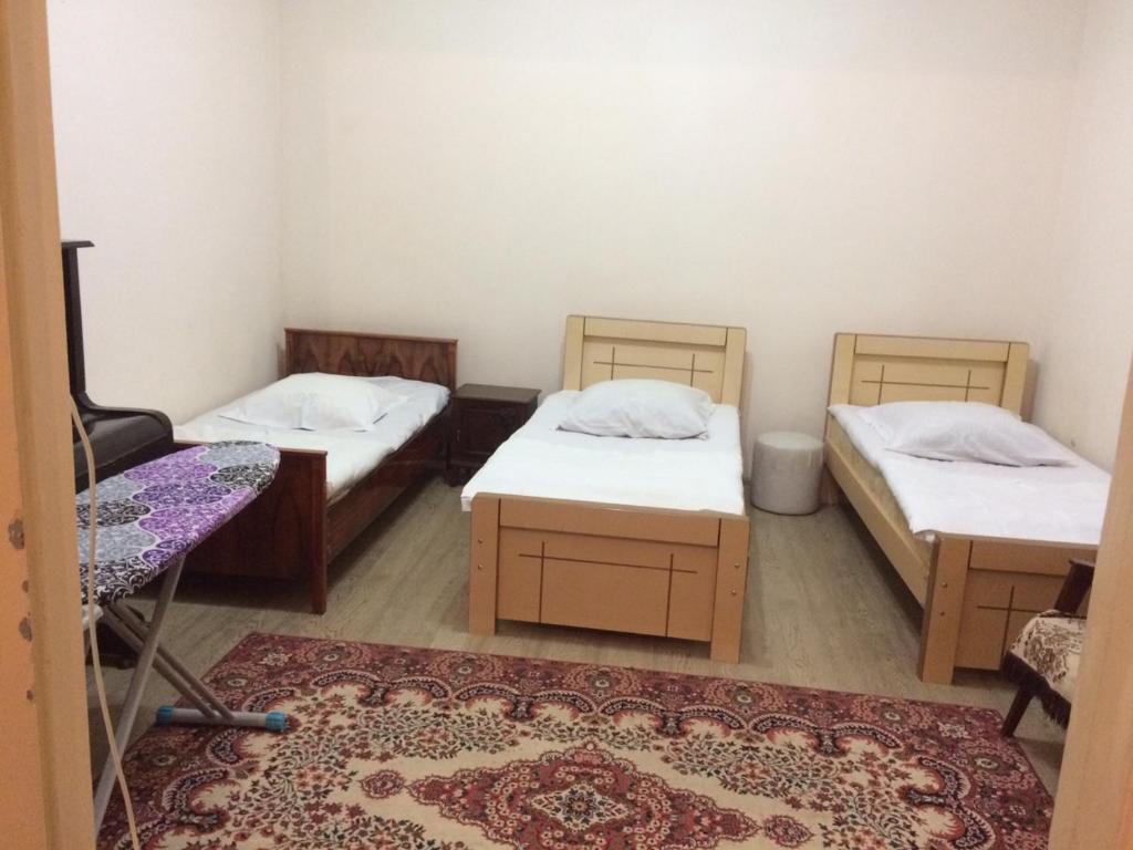 เตียงในห้องที่ Batumi Guesthouse 28a