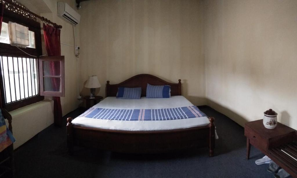 Postel nebo postele na pokoji v ubytování Beatrice House Galle Fort - Homestay