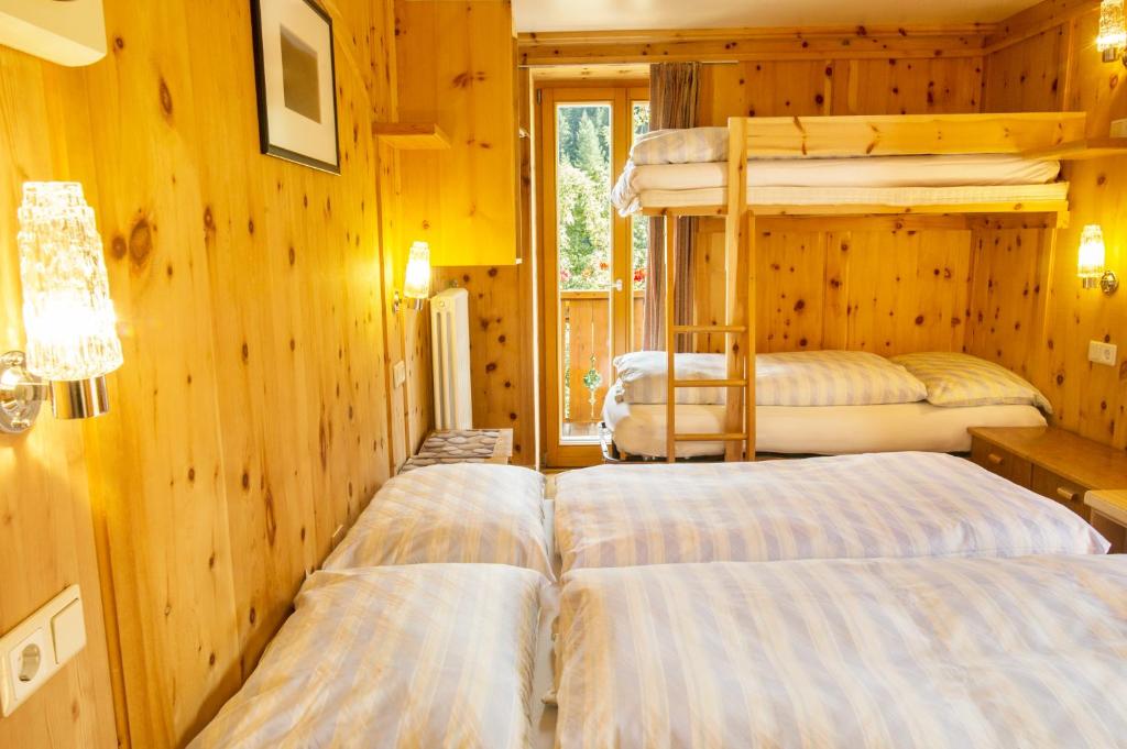 Postel nebo postele na pokoji v ubytování Villa Insam