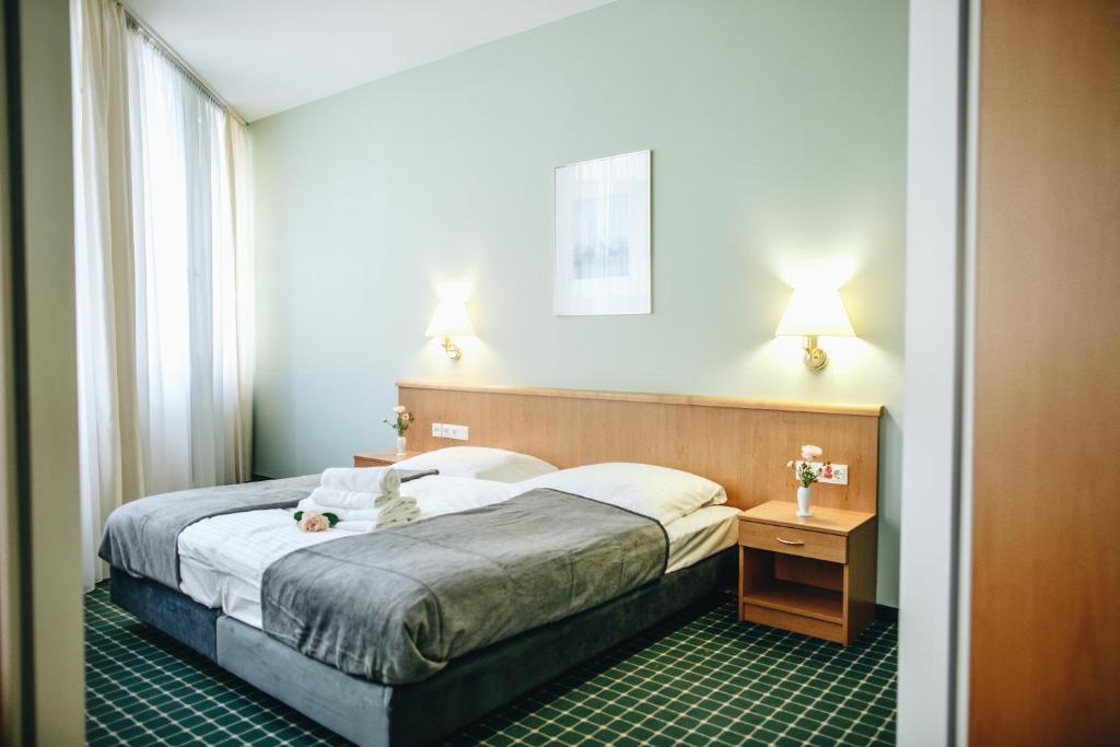 Postel nebo postele na pokoji v ubytování Hotel "Helle Mitte" Berlin