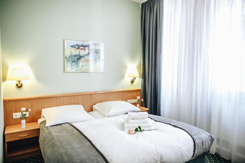 Postel nebo postele na pokoji v ubytování Hotel "Helle Mitte" Berlin