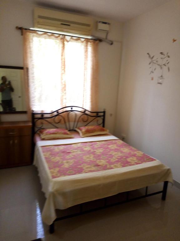 Postel nebo postele na pokoji v ubytování Casberly Apartment