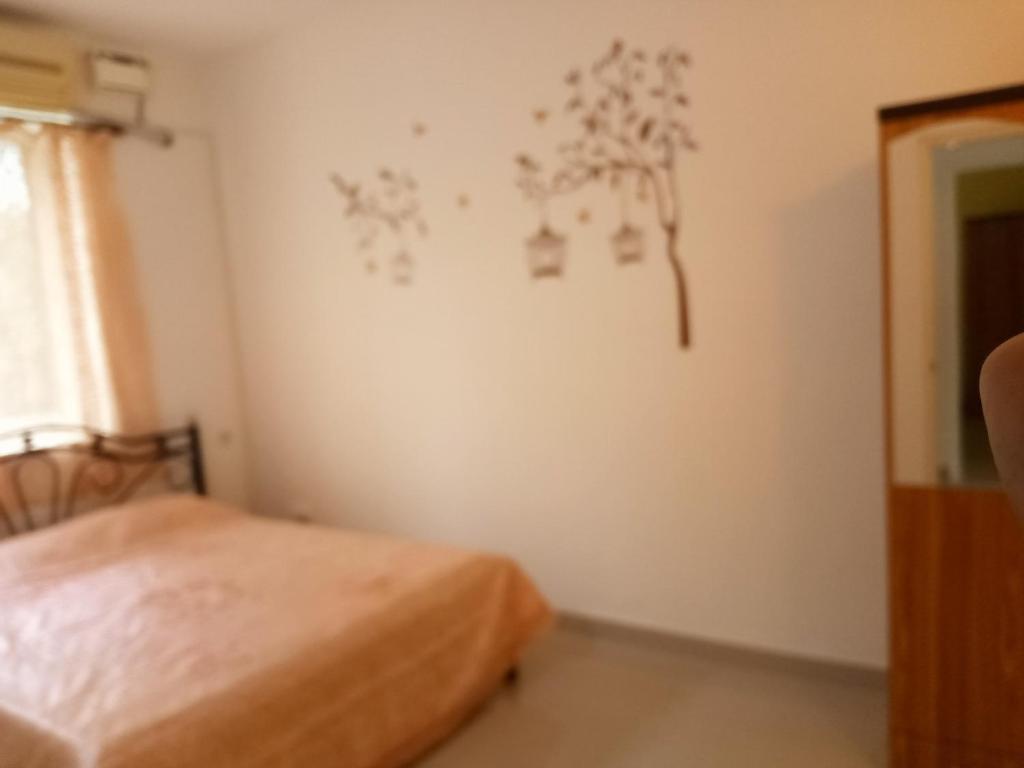 Postel nebo postele na pokoji v ubytování Casberly Apartment