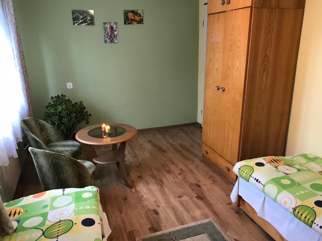 Posteľ alebo postele v izbe v ubytovaní Pokoje Gościnne Pod Magnolią