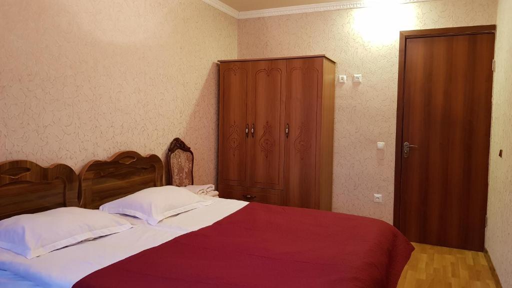 Postel nebo postele na pokoji v ubytování Hilltop Mestia