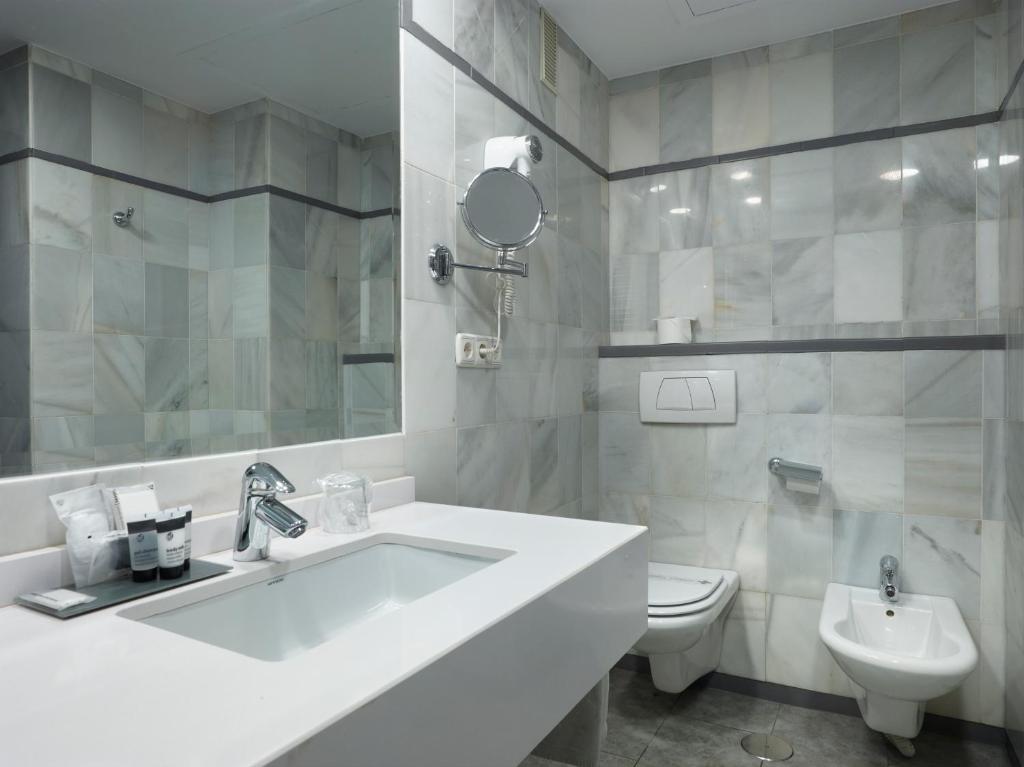 Kúpeľňa v ubytovaní Hotel Maestranza
