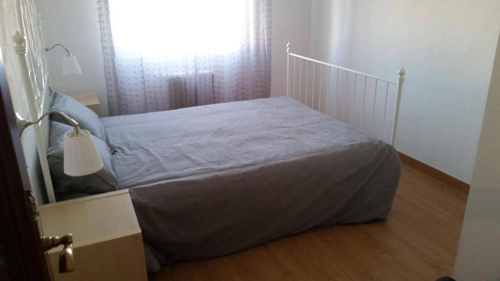 Posteľ alebo postele v izbe v ubytovaní Apartamento TISARE wifi