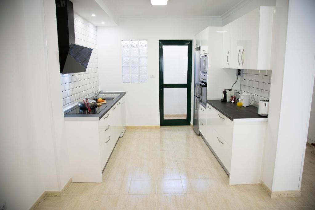 Kuchyň nebo kuchyňský kout v ubytování Villa situada en Maspalomas Gran Canaria,