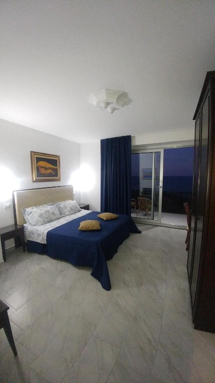 Postel nebo postele na pokoji v ubytování B&B Aquila Reale