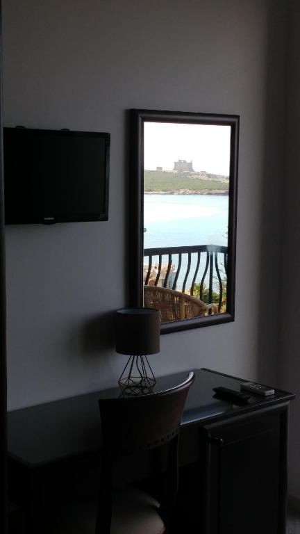 TV a/nebo společenská místnost v ubytování B&B Aquila Reale