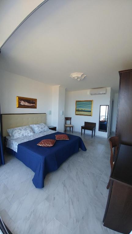 Postel nebo postele na pokoji v ubytování B&B Aquila Reale