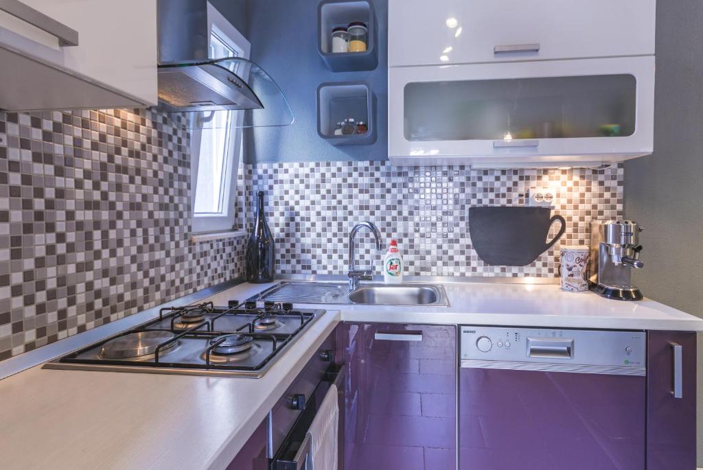 Kuchyň nebo kuchyňský kout v ubytování Apartment Gloria2