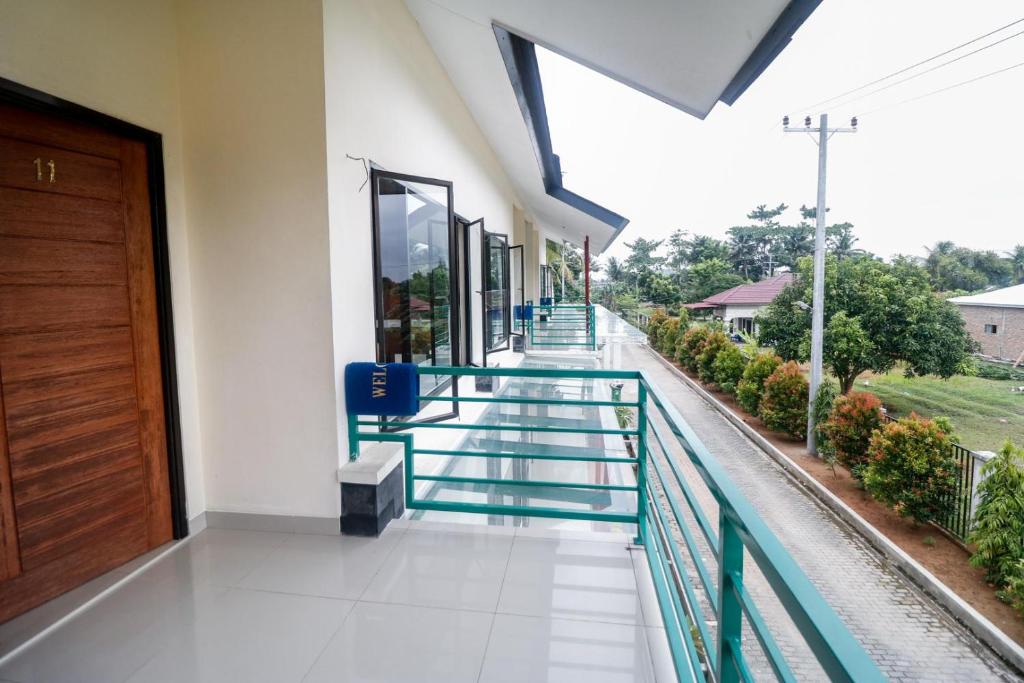 Balkón nebo terasa v ubytování RedDoorz Plus near Kualanamu Airport Medan