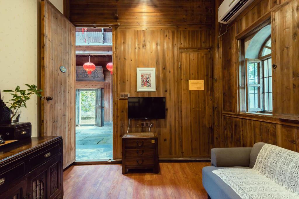 TV a/nebo společenská místnost v ubytování Pig's Boutique Hotel Bishan