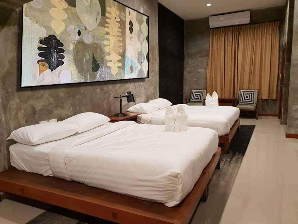 Łóżko lub łóżka w pokoju w obiekcie D Huahin Vintage & Loft