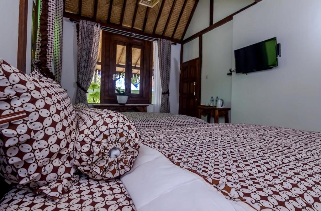 TV o dispositivi per l'intrattenimento presso The Omah Borobudur