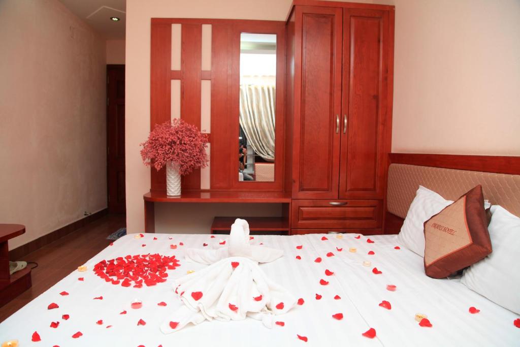 Postel nebo postele na pokoji v ubytování Paradis Hotel