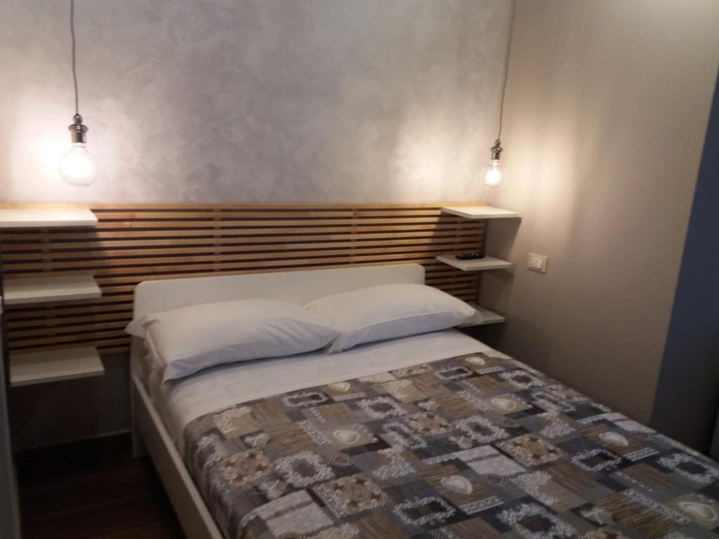 Postel nebo postele na pokoji v ubytování A.J. B&B