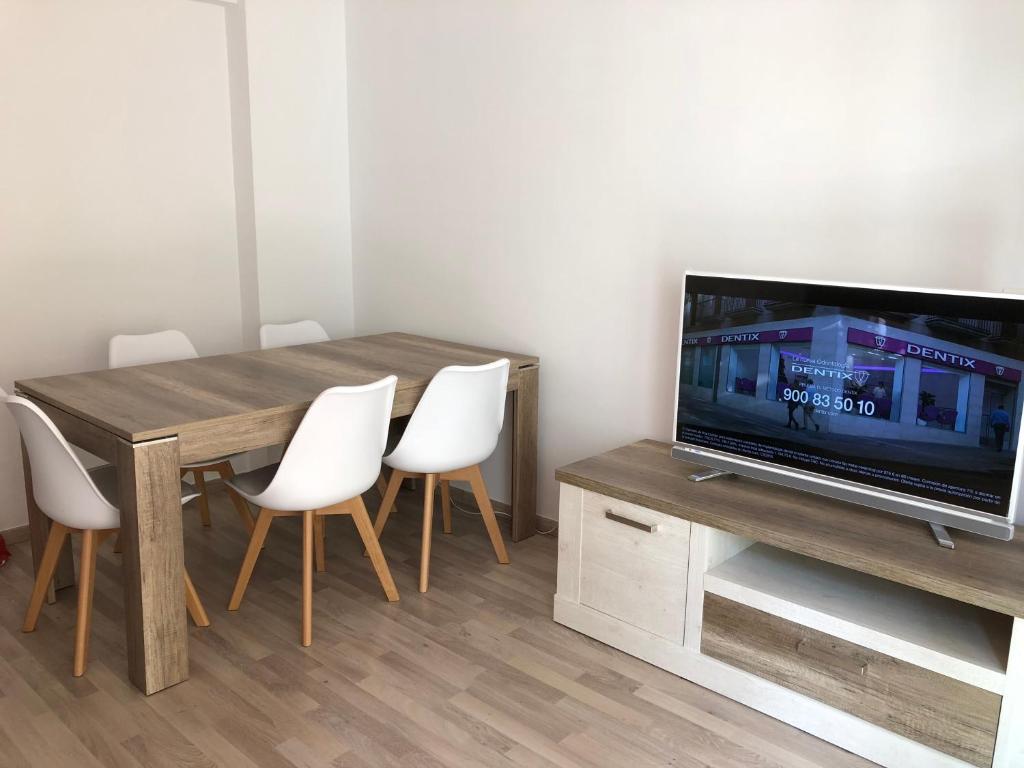 TV a/nebo společenská místnost v ubytování Apartamento Asuncion