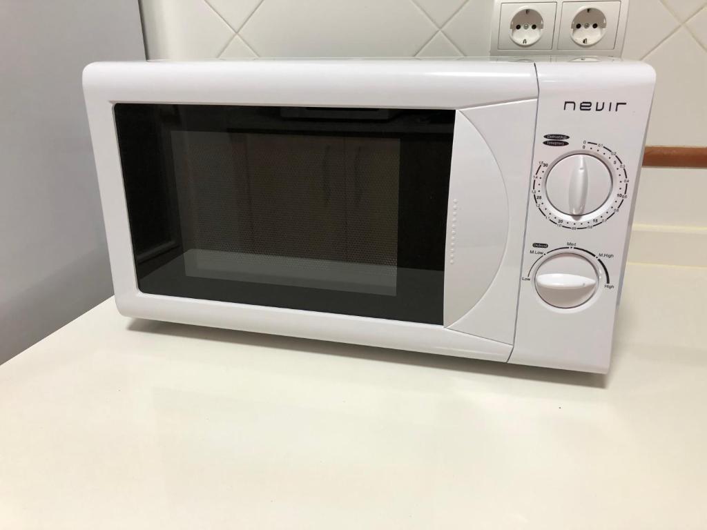 Kuchyň nebo kuchyňský kout v ubytování Apartamento Asuncion