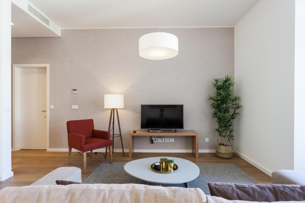 TV a/nebo společenská místnost v ubytování FLH Restauradores Charming Apartment