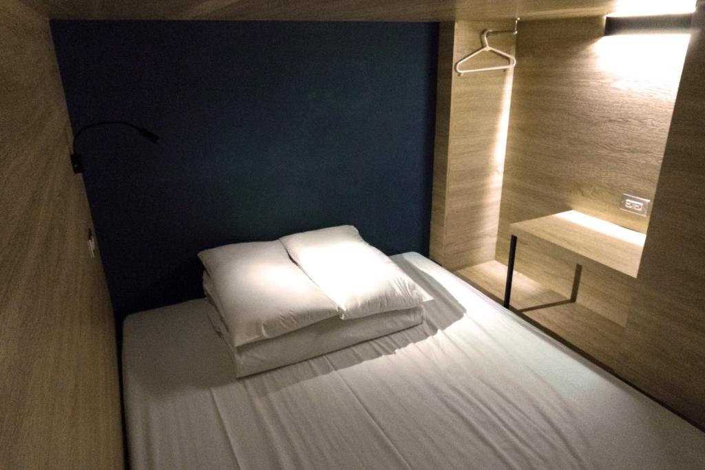 Postel nebo postele na pokoji v ubytování DONGMEN 3 Hostel