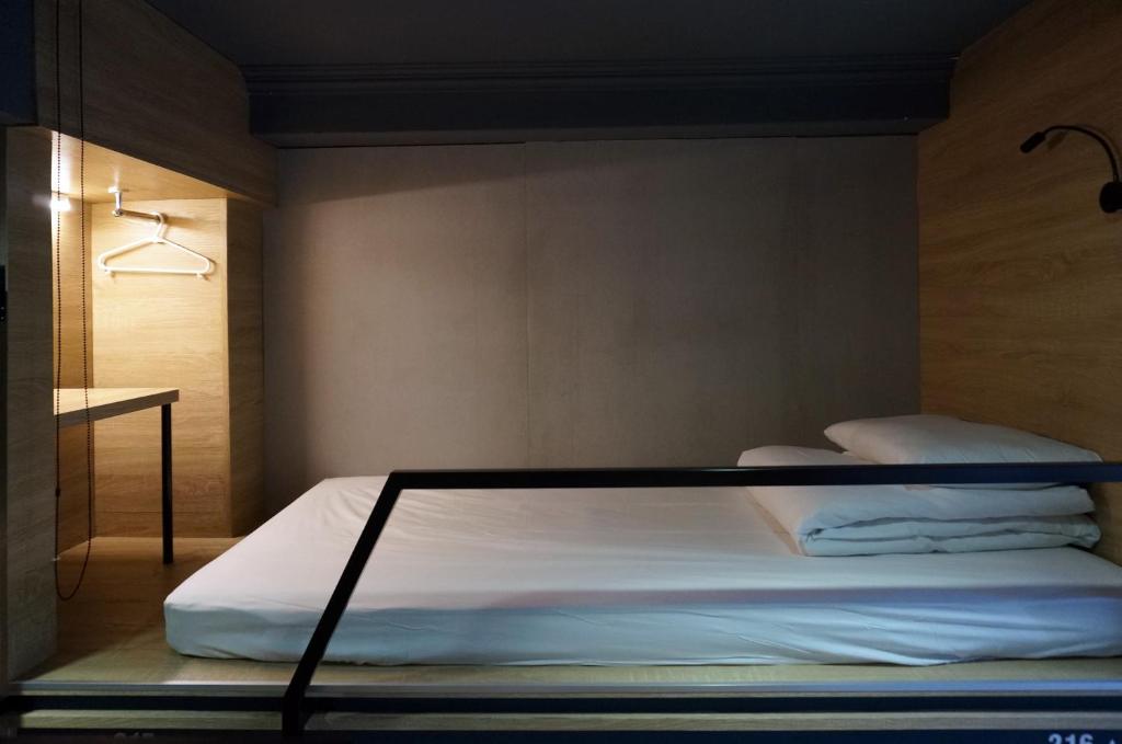 Postel nebo postele na pokoji v ubytování DONGMEN 3 Hostel