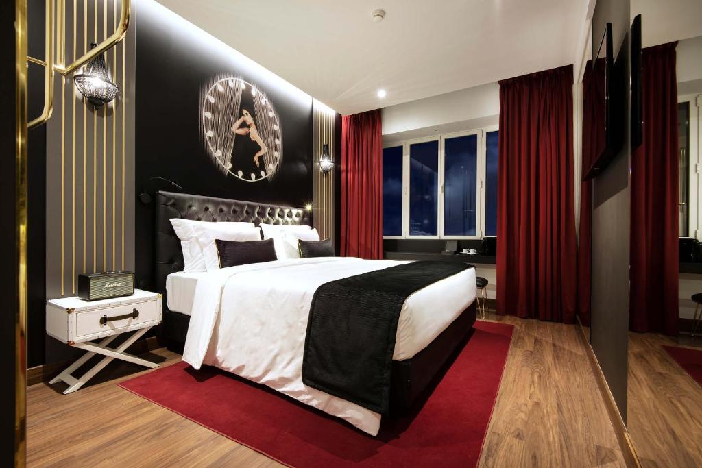 Posteľ alebo postele v izbe v ubytovaní Maxime Hotel Lisbon