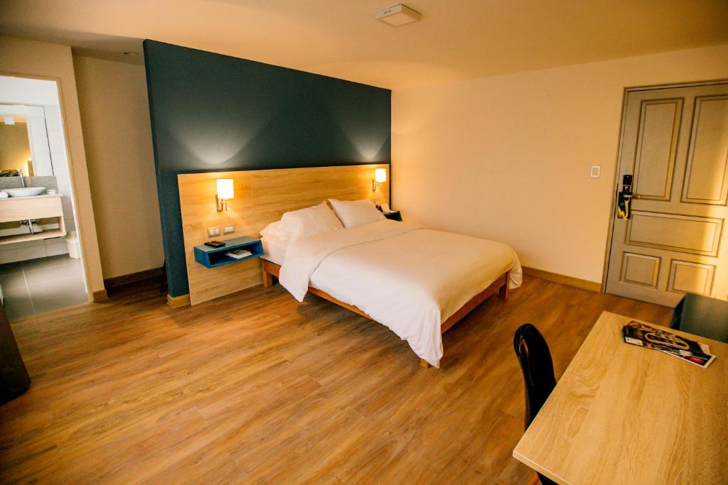Postel nebo postele na pokoji v ubytování Daniel's Apart Hotel
