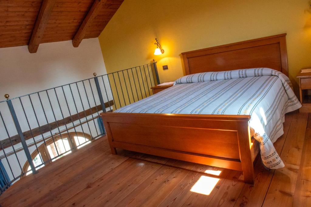 Postel nebo postele na pokoji v ubytování Ristorante Albergo Da Maurizio