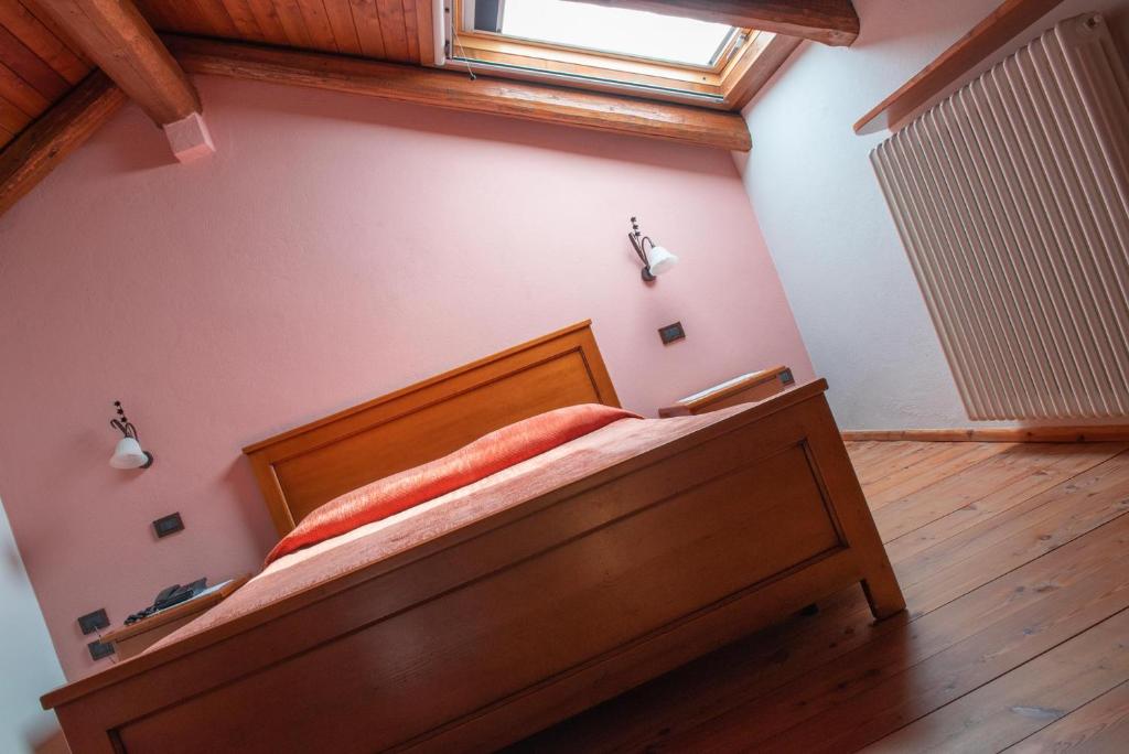 Postel nebo postele na pokoji v ubytování Ristorante Albergo Da Maurizio