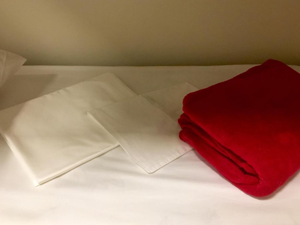 Postel nebo postele na pokoji v ubytování Tapera Hostel